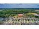 Distant aerial view of the home showing neighborhood layout and nearby open space at 6648 Seaway Dr, Brooksville, FL 34604