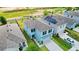 Aerial image of a two-story house with a manicured front lawn and attached two-car garage at 6648 Seaway Dr, Brooksville, FL 34604