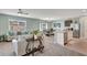 Cozy living room featuring plush seating, natural light, and an open layout at 6648 Seaway Dr, Brooksville, FL 34604