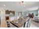 Bright, open floor plan with modern lighting, updated kitchen, and inviting living area at 6648 Seaway Dr, Brooksville, FL 34604