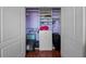 Walk-in closet with custom shelving and ample storage space for optimal organization at 6922 Duffy Ln, Tampa, FL 33616