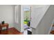 Inviting entryway with hardwood floors and lots of natural light, creating a welcoming ambiance at 6922 Duffy Ln, Tampa, FL 33616