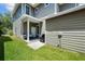 Charming home exterior with well-manicured lawn and a cozy covered front porch at 6922 Duffy Ln, Tampa, FL 33616