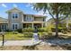 Charming two-story home with welcoming curb appeal and beautifully landscaped front yard at 6922 Duffy Ln, Tampa, FL 33616