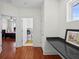 Hallway leading to laundry room and bedroom, featuring a granite countertop at 6922 Duffy Ln, Tampa, FL 33616