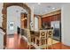 Beautiful kitchen with brick archway, granite countertops, and stainless steel appliances at 6922 Duffy Ln, Tampa, FL 33616
