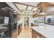 Charming kitchen with stone countertops and modern appliances at 6938 Coronet Dr, New Port Richey, FL 34655