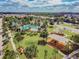 Aerial view of community amenities including pools, playground, and green spaces, perfect for recreation at 7207 Peregrina Loop, Wesley Chapel, FL 33545