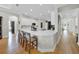 Spacious kitchen with a large island and barstool seating, ideal for entertaining at 7207 Peregrina Loop, Wesley Chapel, FL 33545