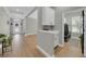 Open-concept interior showcasing laundry area with updated washer and dryer at 7207 Peregrina Loop, Wesley Chapel, FL 33545