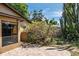 Outside home featuring brick pavers and cactus at 740 Crystal Dr, Palm Harbor, FL 34683