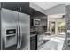 Bright kitchen with stainless steel appliances and breakfast nook at 740 Crystal Dr, Palm Harbor, FL 34683