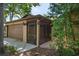 Screened entryway to a house showcasing a covered outdoor space with a view of the front yard at 740 Crystal Dr, Palm Harbor, FL 34683
