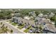 An aerial view of a modern neighborhood showcasing well-maintained homes and green spaces at 7509 S Sherrill St, Tampa, FL 33616