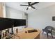 Bright office features a modern desk, comfortable chair, and large double monitor setup at 7509 S Sherrill St, Tampa, FL 33616