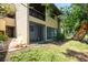 Charming home featuring a screened in patio and mature landscaping at 782 Village Lake N Ter # 102, St Petersburg, FL 33716