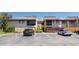 View of exterior featuring a community courtyard and reserved parking spaces at 782 Village Lake N Ter # 102, St Petersburg, FL 33716