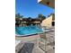 Community pool with plenty of chairs at 782 Village Lake N Ter # 102, St Petersburg, FL 33716