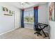 Cozy bedroom with carpeted floor, and large window at 8105 Bilston Village Ln, Gibsonton, FL 33534