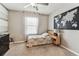 Comfortable bedroom featuring a striking world map and a cozy bed at 8105 Bilston Village Ln, Gibsonton, FL 33534