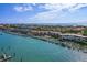 Beautiful aerial showcasing waterfront condos, private boat docks, and sparkling blue water views at 936 Pinellas Bayway S # T-5, Tierra Verde, FL 33715