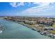 Breathtaking aerial view of waterfront homes with private docks and stunning bay views, perfect for boaters at 936 Pinellas Bayway S # T-5, Tierra Verde, FL 33715