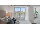 Cozy main bedroom with a view of the marina, featuring a comfortable bed and ample natural light at 936 Pinellas Bayway S # T-5, Tierra Verde, FL 33715