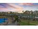 Enjoy poolside relaxation at this waterfront property with boat docks and lush landscaping at 936 Pinellas Bayway S # T-5, Tierra Verde, FL 33715