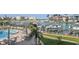 Enjoy poolside relaxation at this waterfront property with boat docks and lush landscaping at 936 Pinellas Bayway S # T-5, Tierra Verde, FL 33715