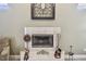 A charming fireplace boasts decorative accents and an elegant marble surround at 9611 125Th N St, Seminole, FL 33772