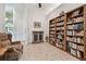 Charming library space with classic decor, bookshelves, and a view of the living area at 9611 125Th N St, Seminole, FL 33772