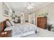 Comfortable main bedroom featuring neutral tones, dresser, and a cozy atmosphere at 9611 125Th N St, Seminole, FL 33772