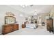 Light filled main bedroom showcases natural light, ample space, and stylish decor at 9611 125Th N St, Seminole, FL 33772