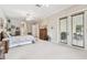 Large main bedroom with access to the backyard and neutral decor at 9611 125Th N St, Seminole, FL 33772