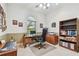 Functional home office with a large window, desk, and ample storage space at 9611 125Th N St, Seminole, FL 33772