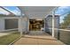 An airy awning leads into this open-concept barn, which has a kitchen and bath at 10101 Bryant Rd, Lithia, FL 33547