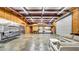 Large garage with workbench, kitchenette, and ample storage space at 10101 Bryant Rd, Lithia, FL 33547