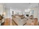 Open floor plan with living room area, fireplace and view of modern kitchen at 10101 Bryant Rd, Lithia, FL 33547