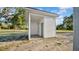 This features a charming outdoor shower stall with a modern design and refreshing blue door at 10101 Bryant Rd, Lithia, FL 33547