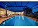 Sparkling in-ground pool with ample lounge seating for relaxing and entertaining at 10101 Bryant Rd, Lithia, FL 33547