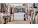 Spacious walk-in closet with custom shelving and built-in drawers for optimal organization at 10101 Bryant Rd, Lithia, FL 33547
