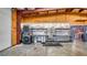 Functional work area with stainless steel shelving, sink, and appliances, offering practicality and convenience at 10101 Bryant Rd, Lithia, FL 33547