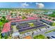 Low-rise condo community featuring pristine landscaping, manicured lawns and convenient parking at 10215 Regal Dr # 41, Largo, FL 33774