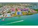 Aerial view of waterfront community with pool and boat dock at 10215 Regal Dr # 41, Largo, FL 33774