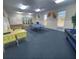 Spacious game room with ping pong, foosball, and vibrant decor at 10215 Regal Dr # 41, Largo, FL 33774