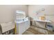 Convenient laundry room area with a washer, dryer, sink, and storage space at 10215 Regal Dr # 41, Largo, FL 33774