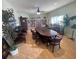 Inside view of community library with a wall of books, tables, and chairs at 10215 Regal Dr # 41, Largo, FL 33774