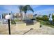 Outdoor grill in community area, perfect for entertaining while enjoying views at 10215 Regal Dr # 41, Largo, FL 33774
