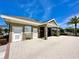 Community pool building with clearly posted rules, drinking fountains and gated pool access for residents at 105 Blue Alice Spring Ct, Ruskin, FL 33570