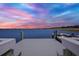 Picturesque view from the dock with colorful sunset over the serene lake at 11743 Lake Lucaya Dr, Riverview, FL 33579